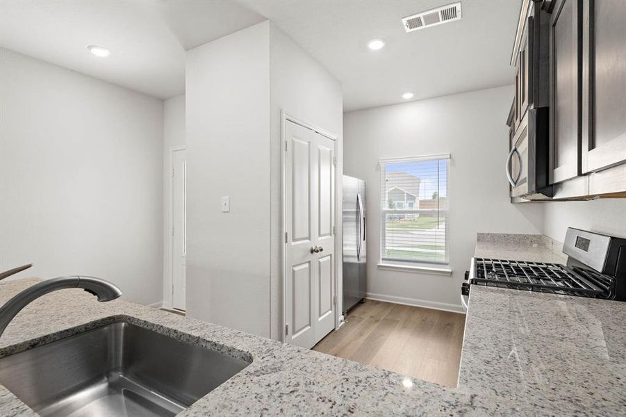 Furnished interior view inside a new home in Logan Square, Fort Worth (Image 3).