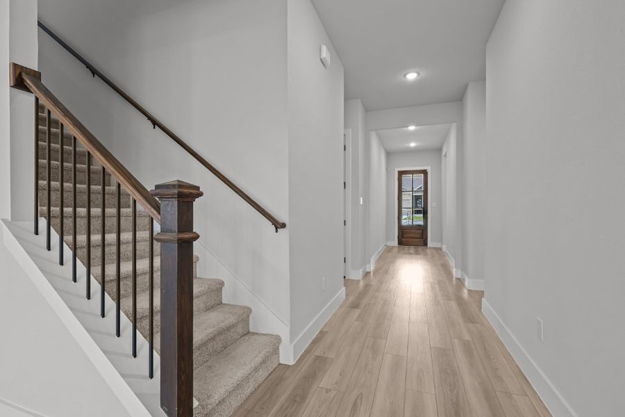 A staircase in a house. A staircase in a house.