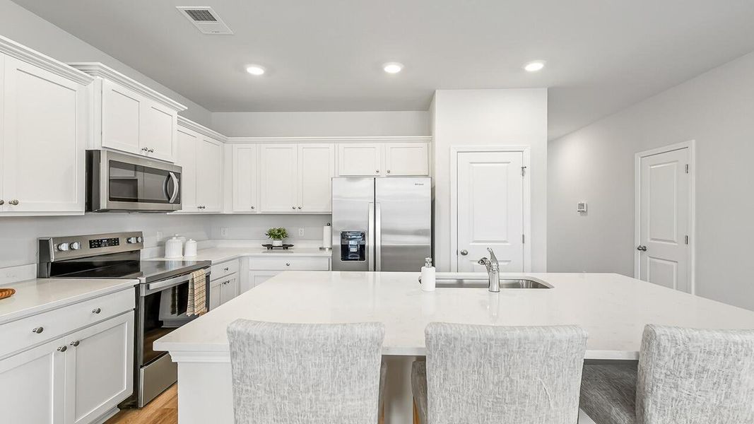 Furnished interior view inside a new home in The Crossing at St. James, Goose Creek (Image 9).