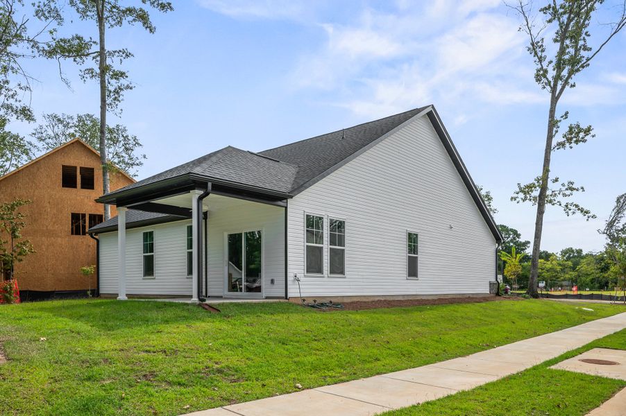Representative exterior photo of a completed home built from the Arlington by Hunter Quinn Homes in Huckleberry Estates, Conway, SC (Image 25). Representative exterior photo of a completed home built from the Arlington by Hunter Quinn Homes in Huckleberry Estates, Conway, SC (Image 25).