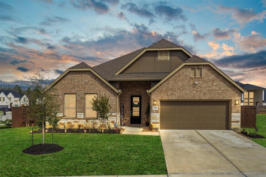 Front exterior of a new home in The Trails, New Caney, TX, highlighting curb appeal (Image 20). Front exterior of a new home in The Trails, New Caney, TX, highlighting curb appeal (Image 20).