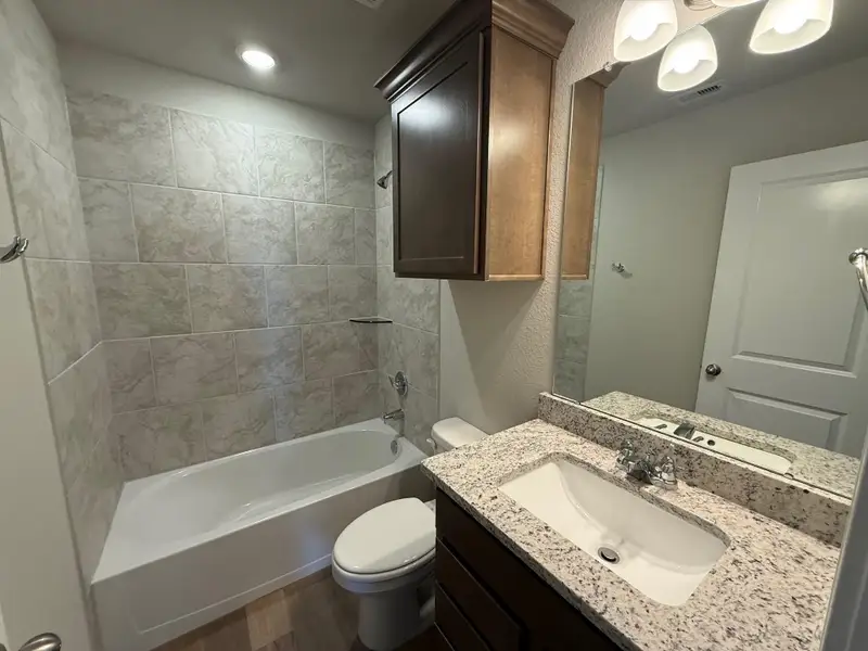 Furnished interior view inside a new home in Southern Pointe, College Station (Image 3).