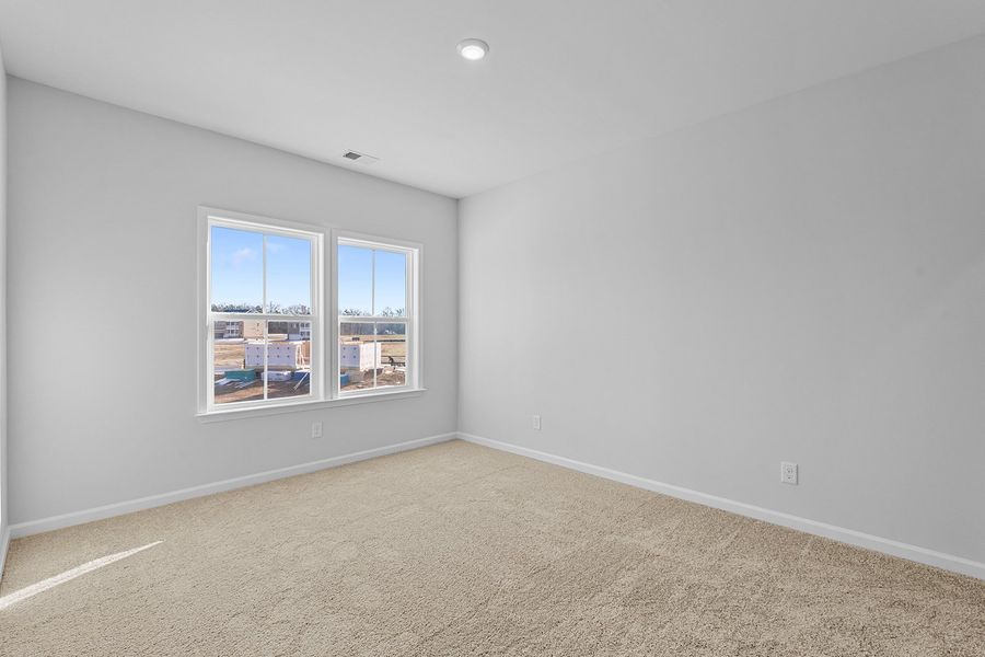 Spacious, unfurnished interior of a new home in Lilah Grove, Summerfield (Image 39).