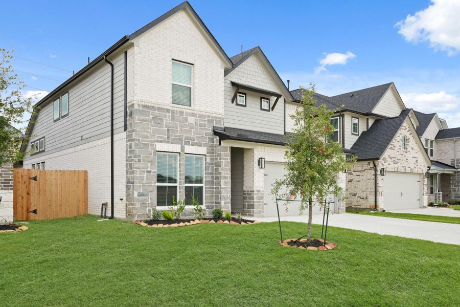 Front exterior of a new home in Morton Creek Ranch, Katy, TX, highlighting curb appeal (Image 14). Front exterior of a new home in Morton Creek Ranch, Katy, TX, highlighting curb appeal (Image 14).