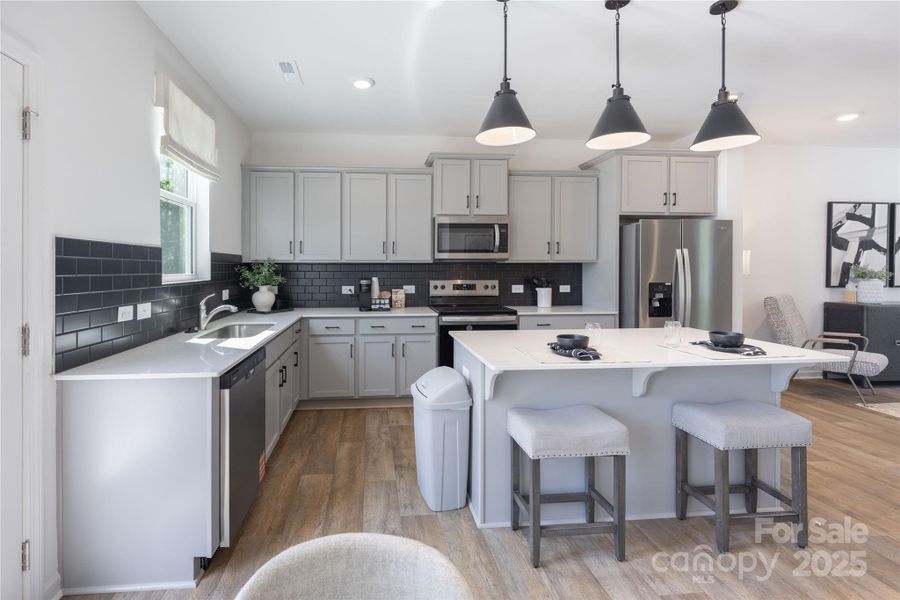 Furnished interior in a model home at Dukes Ridge in Charlotte (Image 6).
