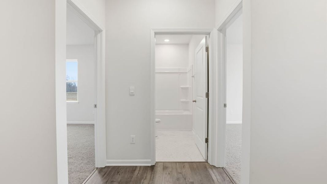 Spacious, unfurnished interior of a new home in Waverly Station, Greenwood (Image 10).