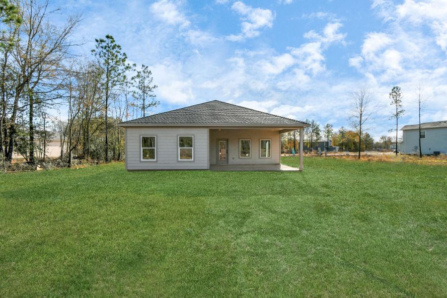Front exterior of a new home in , Cleveland, TX, highlighting curb appeal (Image 1). Front exterior of a new home in , Cleveland, TX, highlighting curb appeal (Image 1).