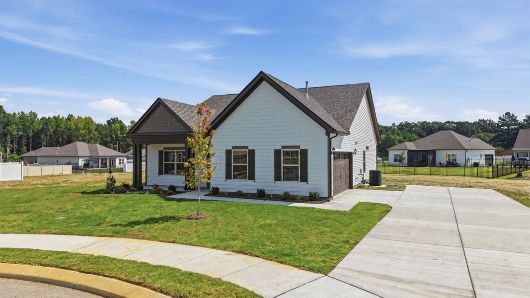 Front exterior of a new home in Stillwater, Tullahoma, TN, highlighting curb appeal (Image 2). Front exterior of a new home in Stillwater, Tullahoma, TN, highlighting curb appeal (Image 2).