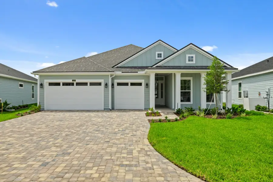 Representative exterior photo of a completed home built from the Aurora by Riverside Homes in Sagebrush at EverRange, Jacksonville, FL (Image 29).