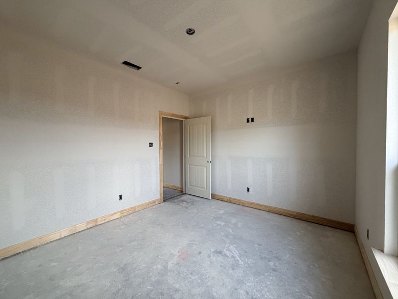 In-progress construction of a new home in Saddle Crest Estates, Weatherford, TX (Image 25).