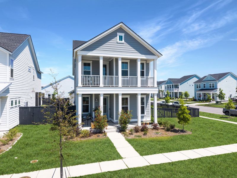 Front exterior of a new home in Carnes Crossroads, Summerville, SC, highlighting curb appeal (Image 24). Front exterior of a new home in Carnes Crossroads, Summerville, SC, highlighting curb appeal (Image 24).