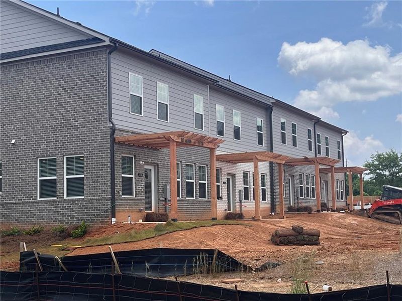 Front exterior of a new home in Governors Parc, Kennesaw, GA, highlighting curb appeal (Image 19). Front exterior of a new home in Governors Parc, Kennesaw, GA, highlighting curb appeal (Image 19).