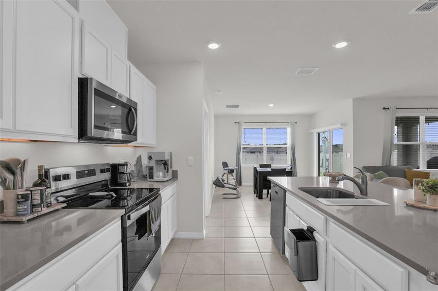 Furnished interior view inside a new home in Timberwalk, Mount Dora (Image 31).