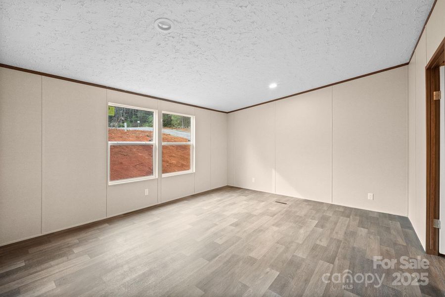 Spacious, unfurnished interior of a new home in , Lenoir (Image 12).