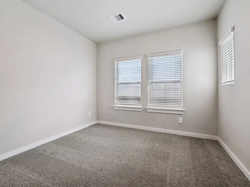 Spacious, unfurnished interior of a new home in Bridge Creek Village - City Series, Cypress (Image 24). Spacious, unfurnished interior of a new home in Bridge Creek Village - City Series, Cypress (Image 24).