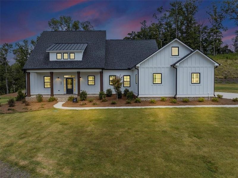 Front exterior of a new home in , Ball Ground, GA, highlighting curb appeal (Image 2).