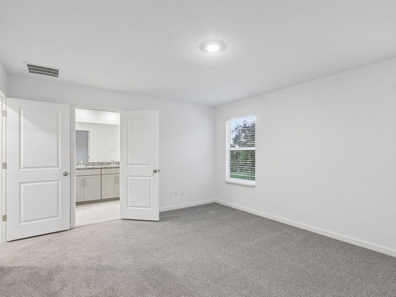 Spacious, unfurnished interior of a new home in The District at Oakleaf - The Grove, Middleburg (Image 11).