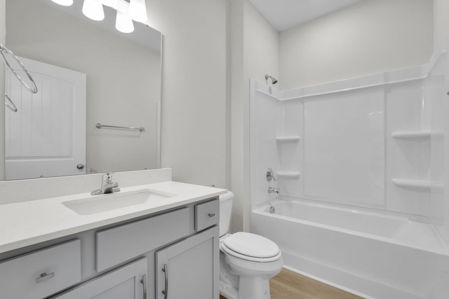 Furnished interior in a model home at Sweetwater in Brunswick (Image 18).