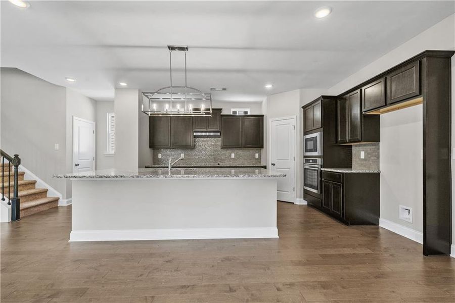 Furnished interior view inside a new home in Edenglen, Buford (Image 6).