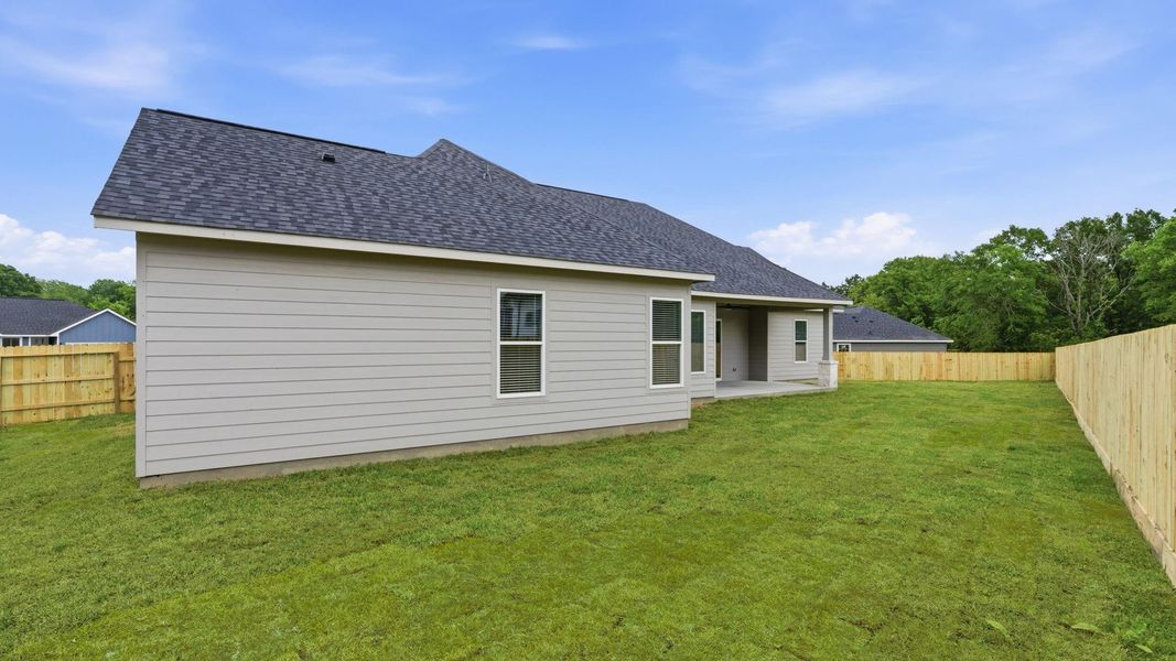 Exterior details and patio area of a home in , New Waverly (Image 3).