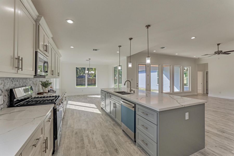 So many beautiful sightlines throughout this open floor plan. Note: never used appliances are waiting for you! So many beautiful sightlines throughout this open floor plan. Note: never used appliances are waiting for you!