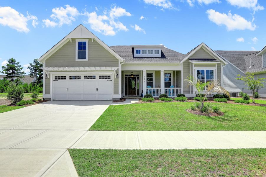 Representative exterior photo of a completed home built from the Claremont by Bill Clark Homes in The Sanctuary at Sunset Beach, Sunset Beach, NC (Image 27). Representative exterior photo of a completed home built from the Claremont by Bill Clark Homes in The Sanctuary at Sunset Beach, Sunset Beach, NC (Image 27).