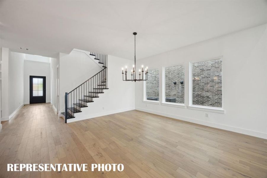 Featuring a beautiful entry and light filled dining room, our Mason III plan is a dream home come to life!  REPRESENTATIVE PHOTO