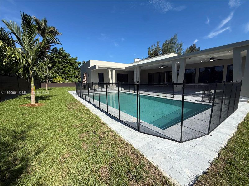 Front exterior of a new home in , Miami, FL, highlighting curb appeal (Image 27).