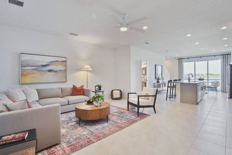 Representative furnished interior of a home built from the Morgan by Neal Communities in SkySail, Naples (Image 28).