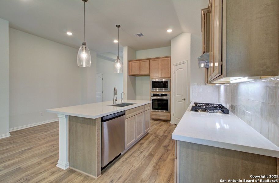 Furnished interior view inside a new home in The Crossvine, Schertz (Image 12).