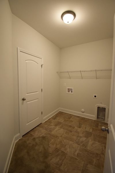 Representative unfurnished interior of a home built from the Ellerbe by Keystone Homes NC in Sullivans Reserve, Walkertown (Image 35).