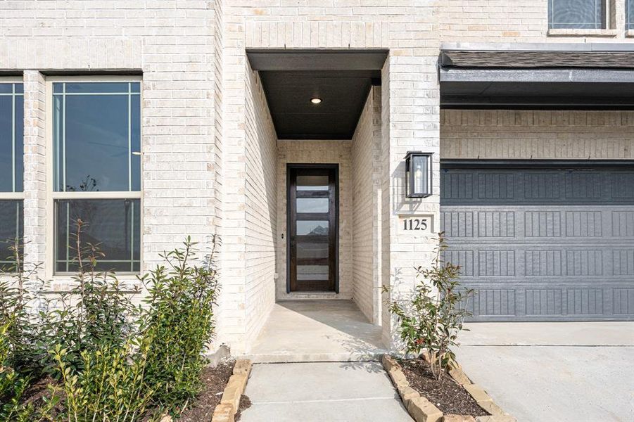 Exterior details and patio area of a home in Hunters Ridge, Crowley (Image 28).