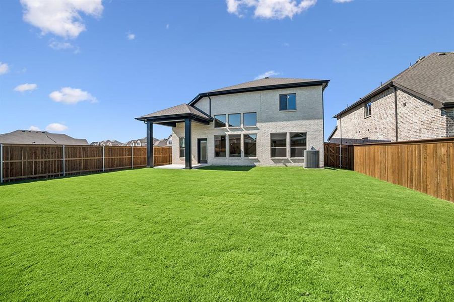Exterior details and patio area of a home in Creekshaw – Classic, Royse City (Image 2). Exterior details and patio area of a home in Creekshaw – Classic, Royse City (Image 2).