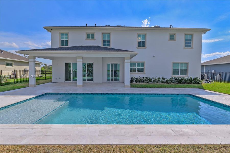 Exterior details and patio area of a home in Arden: The Waterford Collection, Loxahatchee (Image 39).