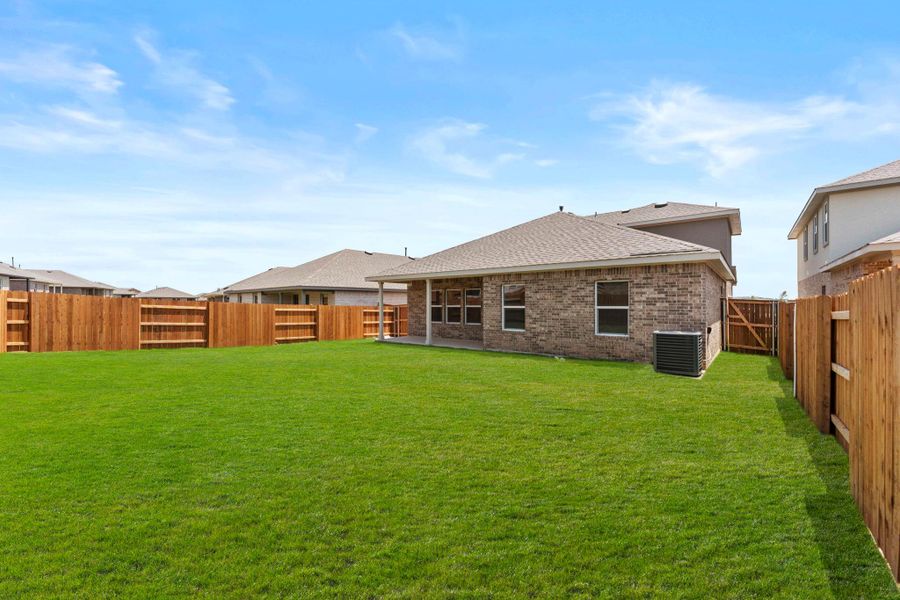 Exterior details and patio area of a home in Bar W Ranch, Leander (Image 19). Exterior details and patio area of a home in Bar W Ranch, Leander (Image 19).