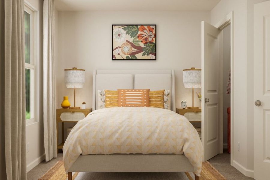 A bedroom with a bed and lamps.