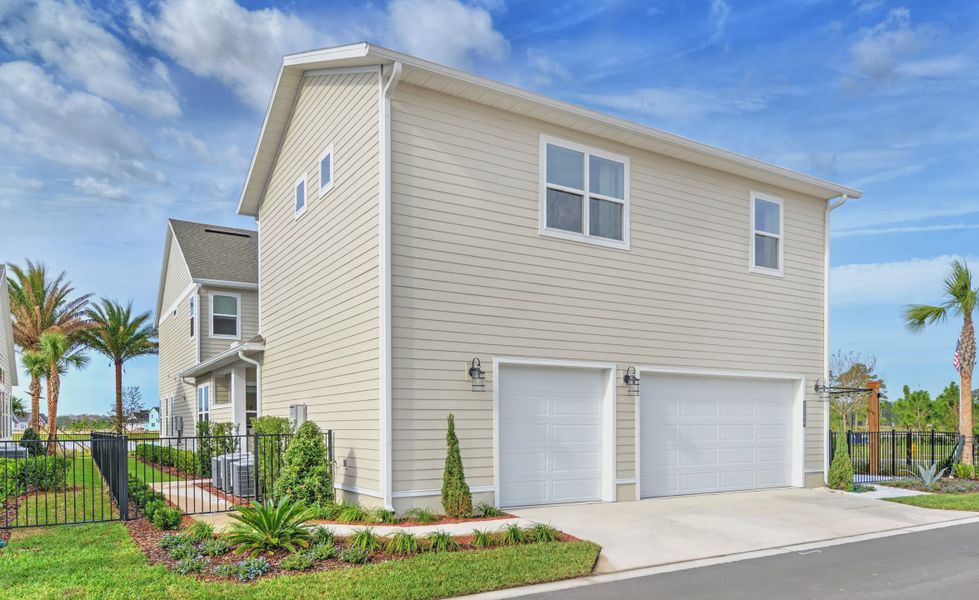 Front exterior of a new home in Seven Pines, Jacksonville, FL, highlighting curb appeal (Image 24).