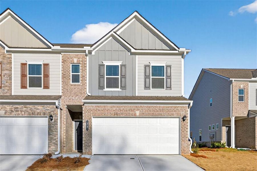 Front exterior of a new home in Franklin Manor, Lawrenceville, GA, highlighting curb appeal (Image 1). Front exterior of a new home in Franklin Manor, Lawrenceville, GA, highlighting curb appeal (Image 1).