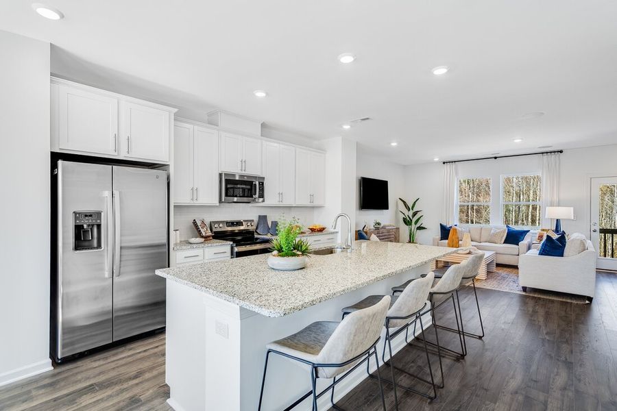 Representative furnished interior of a home built from the Cobblestone by Taylor Morrison in Silverstone Townes, Knightdale (Image 7).