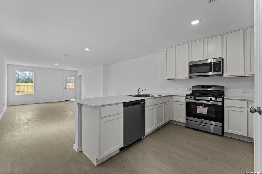 Furnished interior view inside a new home in Torian Village, San Antonio (Image 4).