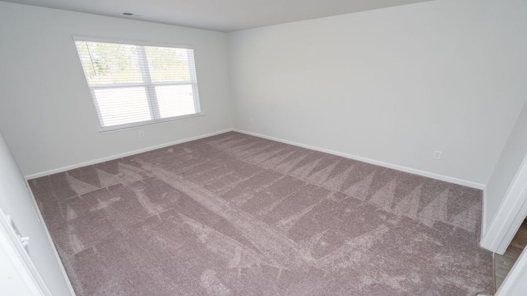 Representative unfurnished interior of a home built from the Cali by D.R. Horton in Jordanville Farms, Galivants Ferry (Image 32).