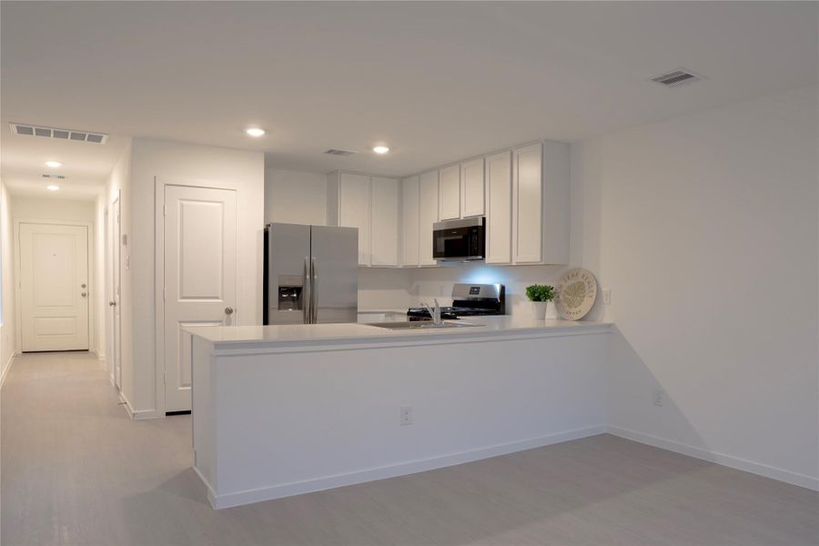 Furnished interior view inside a new home in Tavola, New Caney (Image 5).