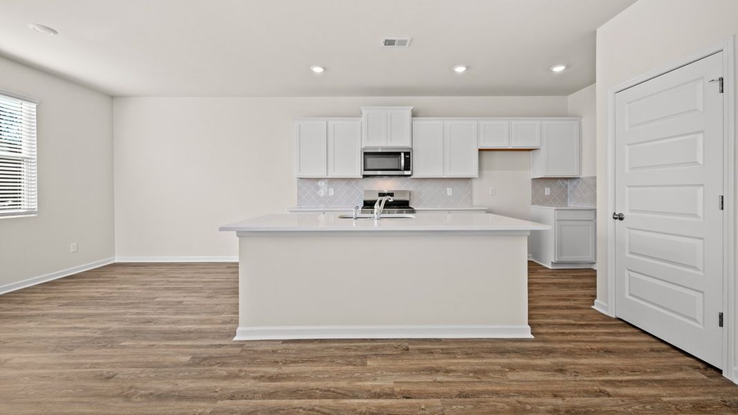 Representative furnished interior of a home built from the Edmon by D.R. Horton in Poplar Preserve, Newnan (Image 5).