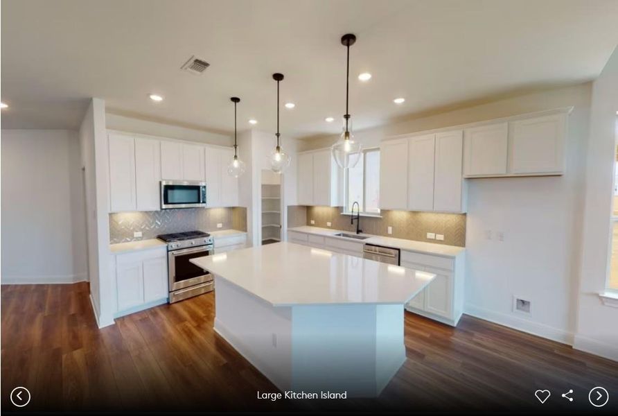 Interior photos- Photo of Pulte model home with same floor plan, not of actual home listed.