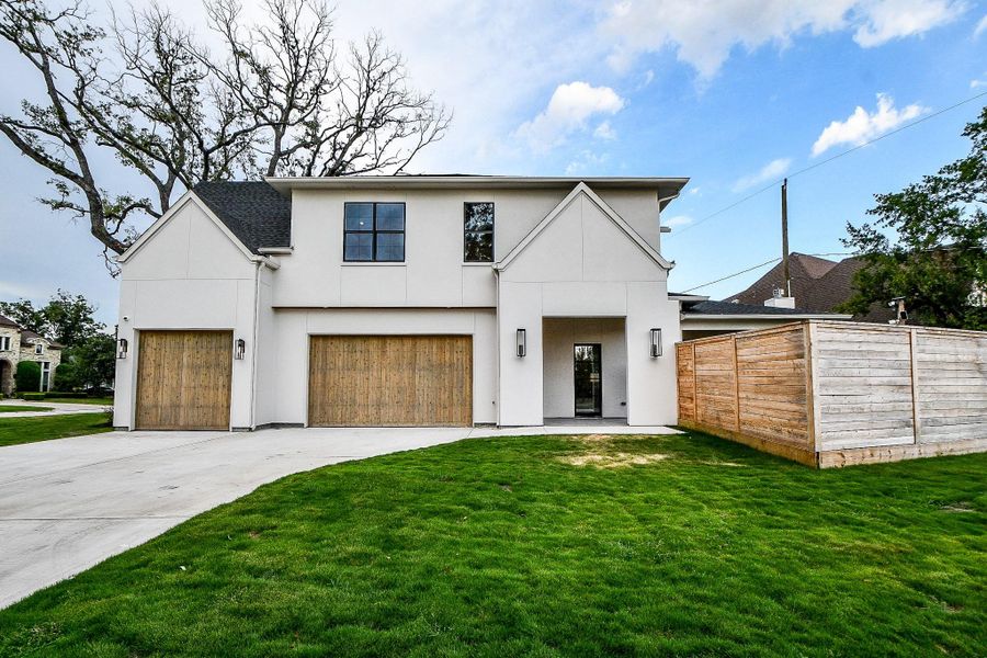 Front exterior of a new home in , Houston, TX, highlighting curb appeal (Image 26).