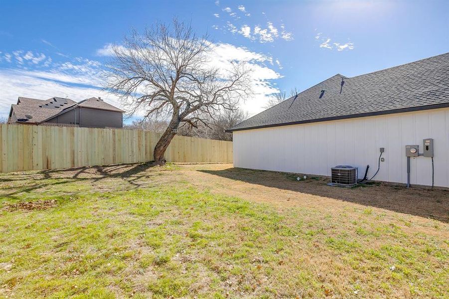 Exterior details and patio area of a home in , Runaway Bay (Image 24).