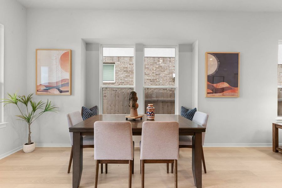 Representative furnished interior of a home built from the Wilson by Chesmar Homes in Deerbrooke Cottages, Leander (Image 8).