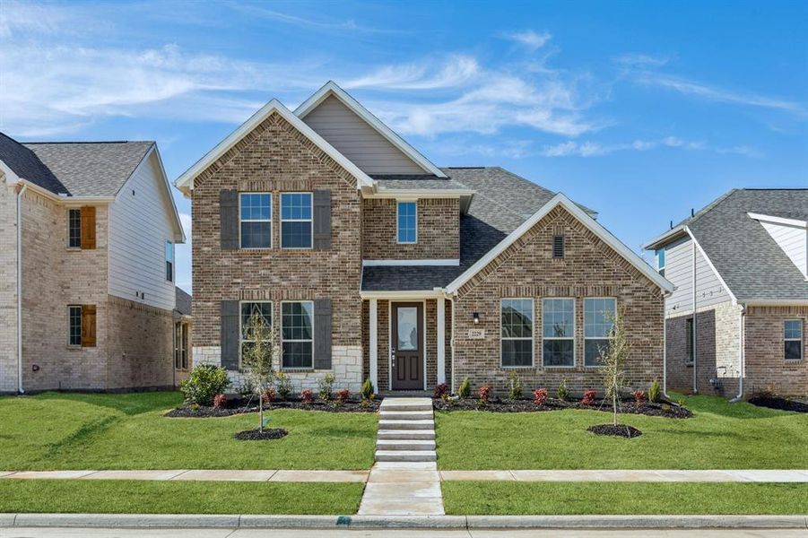 View of front of home with a front lawn