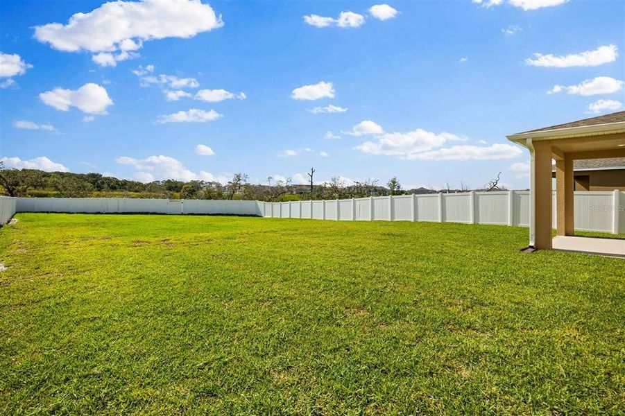 Front exterior of a new home in , Winter Garden, FL, highlighting curb appeal (Image 1).