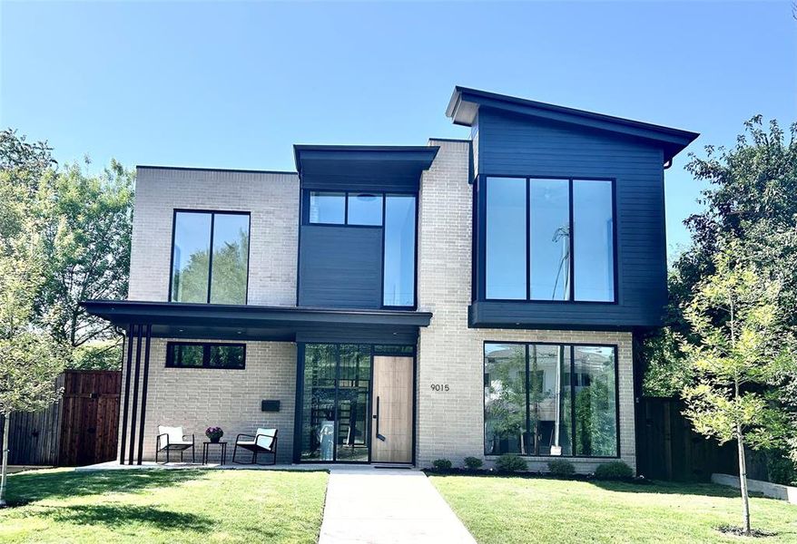 Front exterior of a new home in , Dallas, TX, highlighting curb appeal (Image 25).